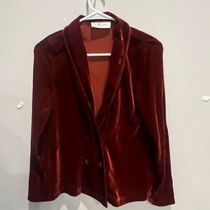Burnt orange below Molly Green blazer